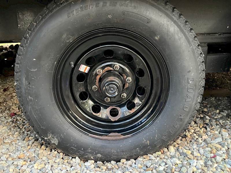 What one of my wheels looked like after scraping off the loose paint.